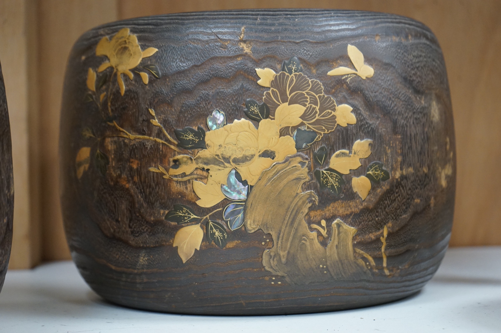A pair of Japanese hibachi bowls with lacquered decoration and abalone inlay, label to the bases, 29cm in diameter. Condition - fair, some inlay missing